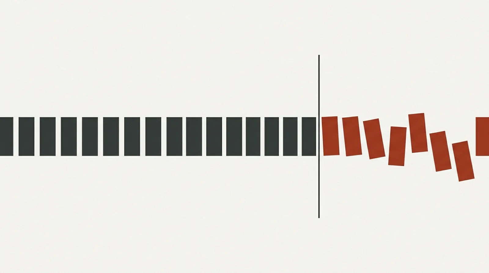 An orderly row of dark blocks, a vertical boundary line, and beyond it the blocks tilting and scattering in red.