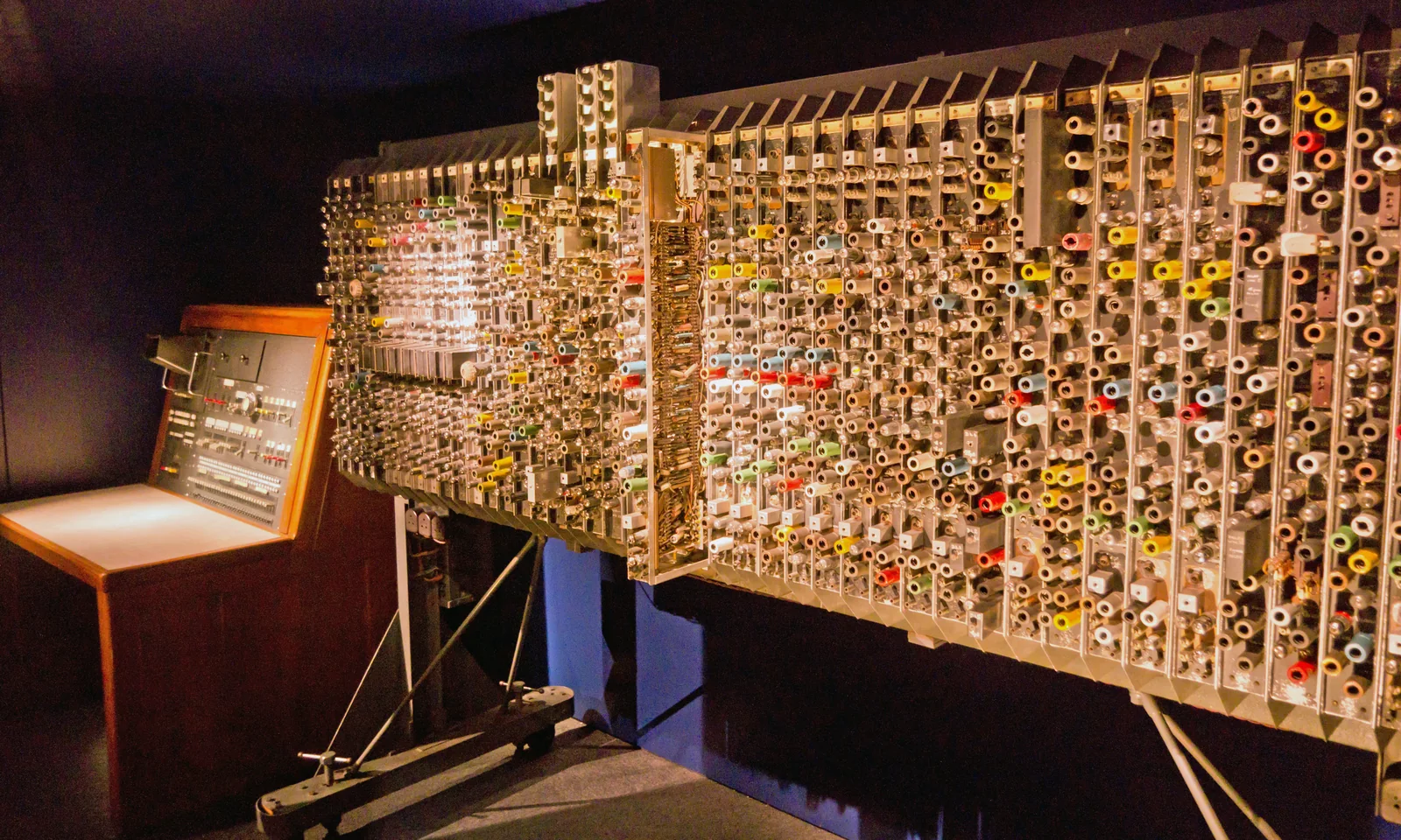 A tall rack of 1950s electronics, open at the front, showing rows of valves and wiring.